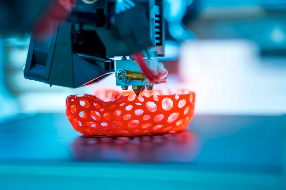 Large-format 3D printer building a sculptural part in the Platinum Signs workshop