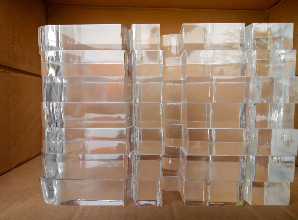 Thick clear acrylic blocks cut and packed for delivery