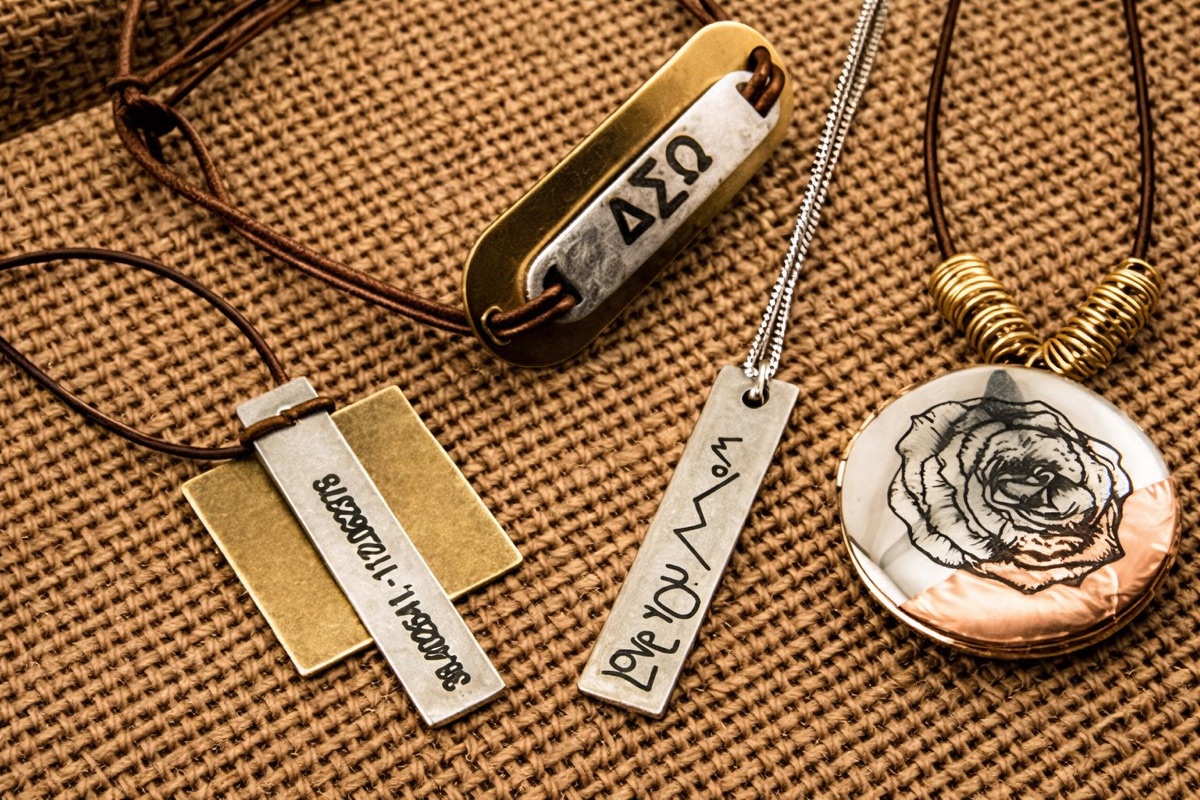Engraved metal pendants and personalised tags