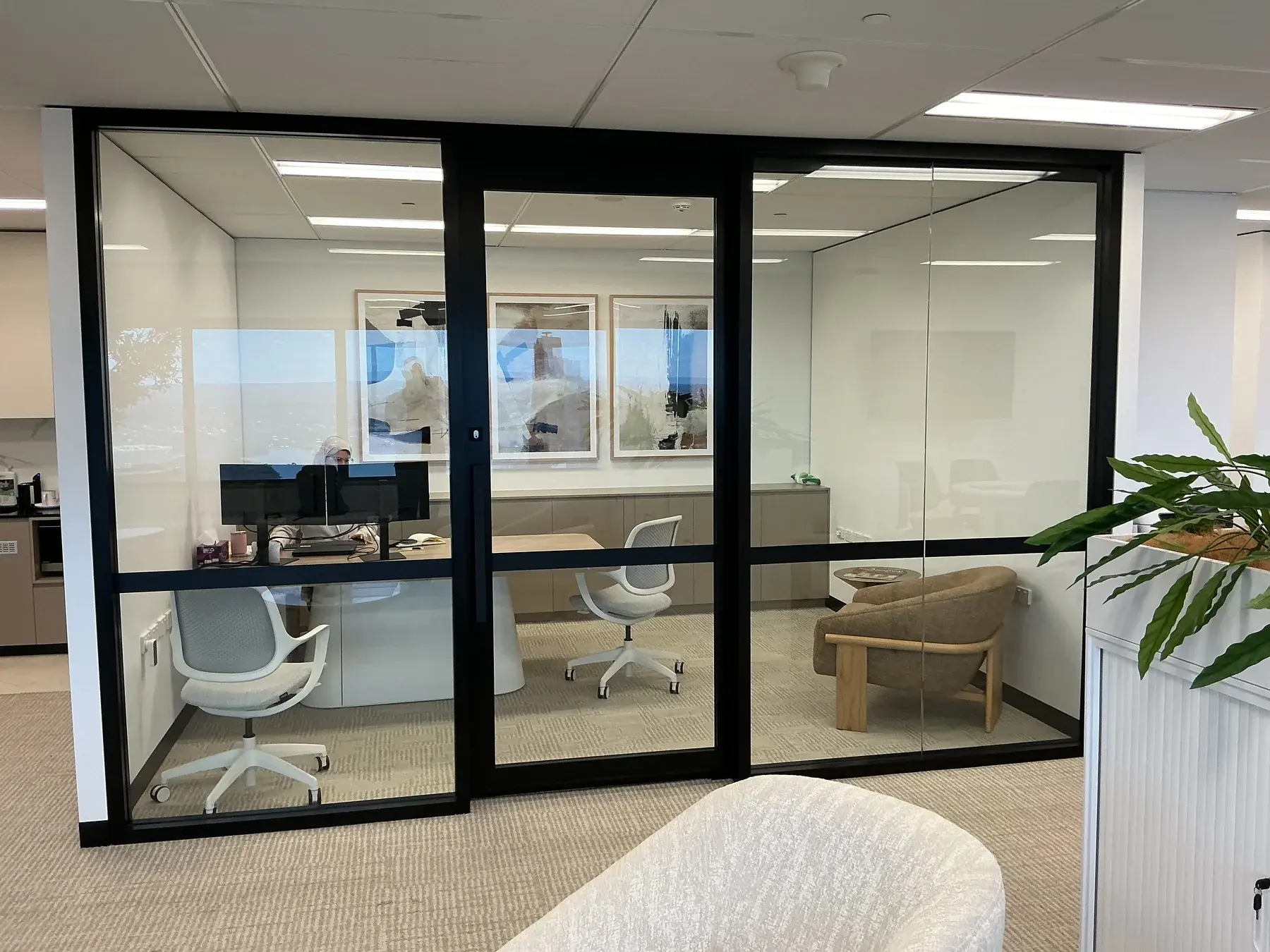 Aramco office glazing and surrounding furniture recorded as project context for a later stage