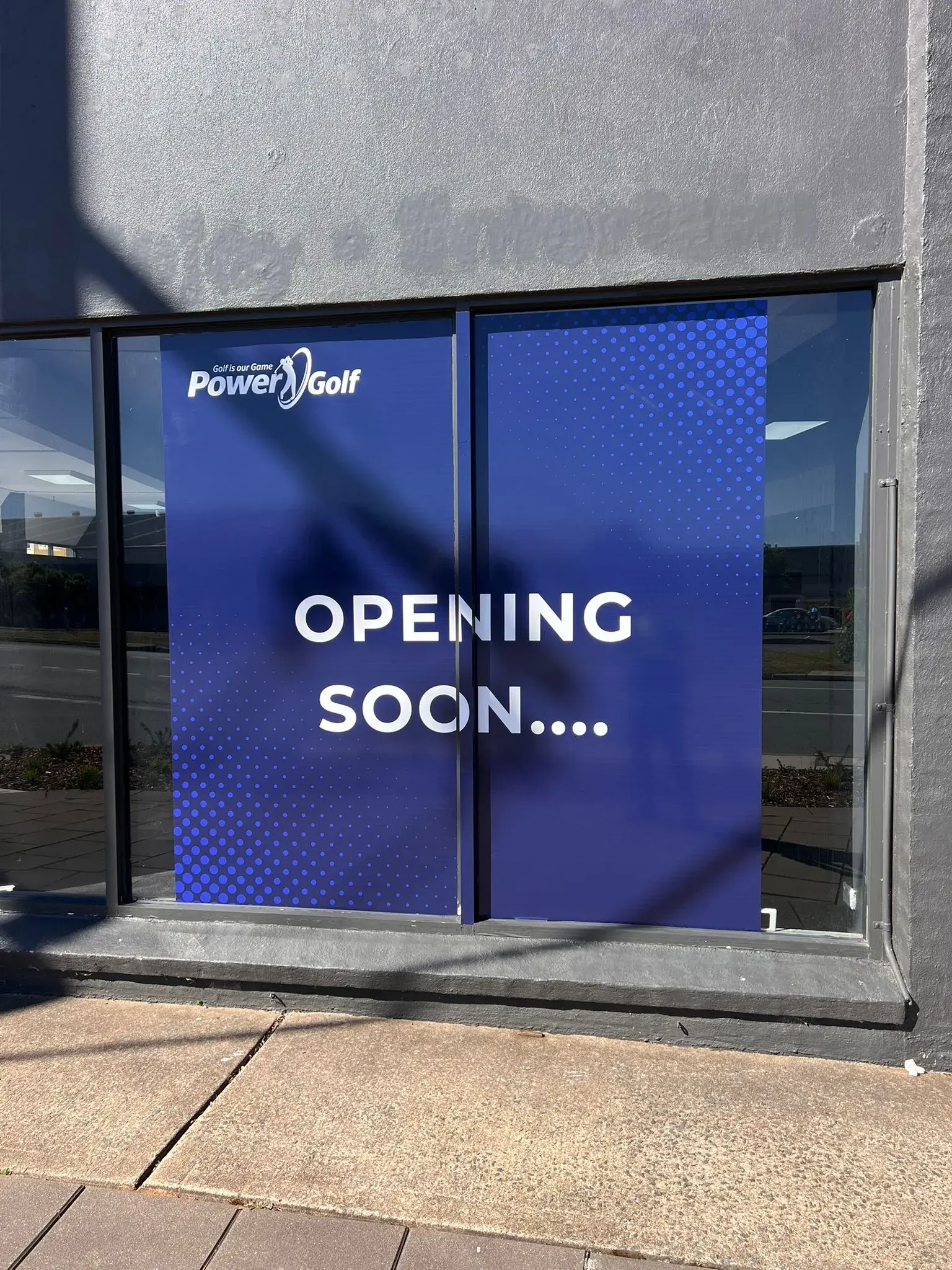 Opening soon campaign window graphic installed on the glazing before the store launch