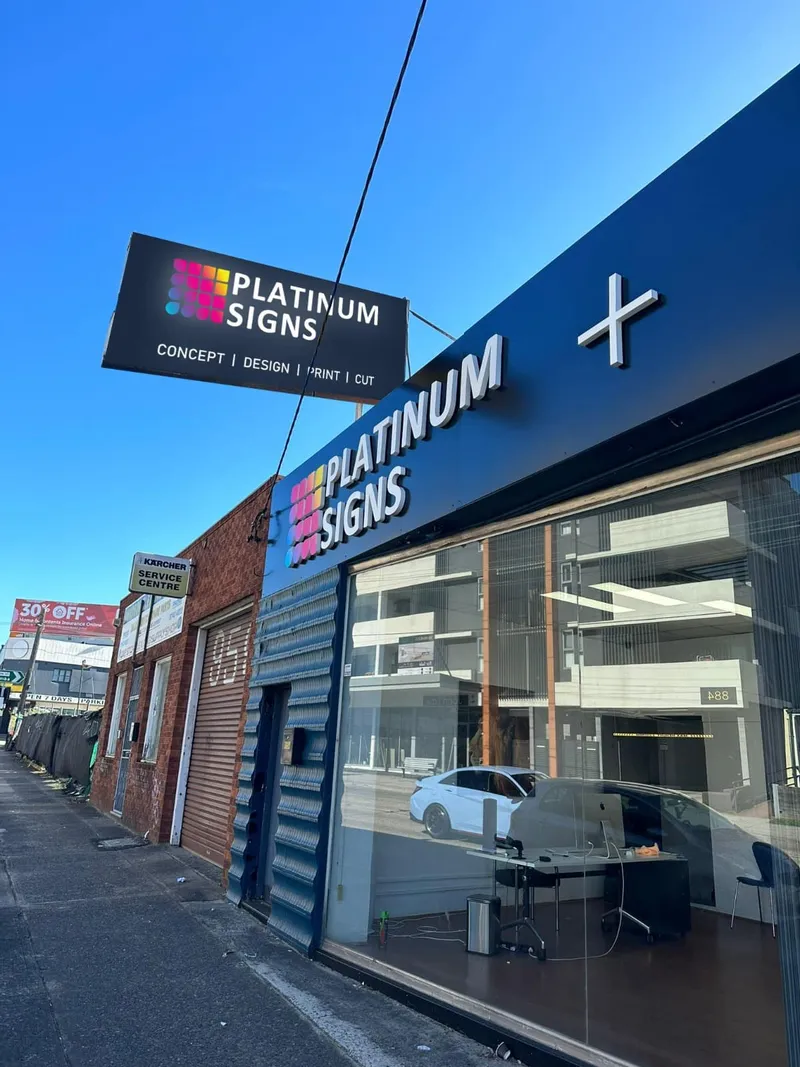 Platinum Signs fascia, projecting sign and branded glazing on the company frontage.