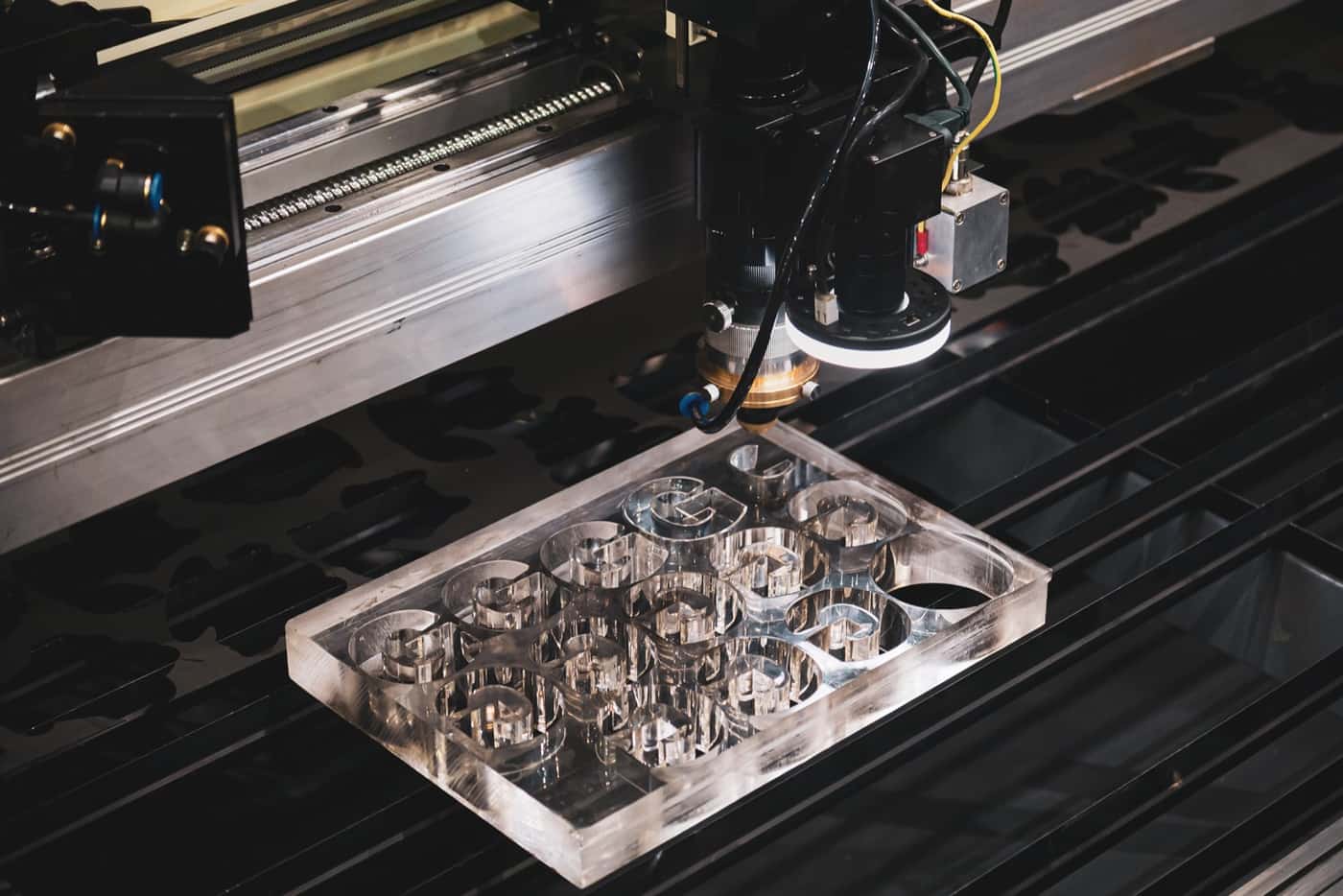 Commercial CO2 laser cutting clear acrylic components
