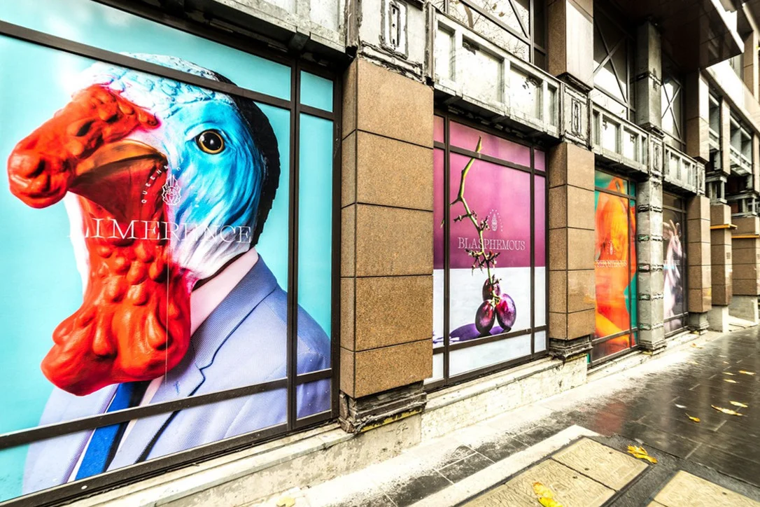 Colourful illustrated window graphics across a retail shopfront